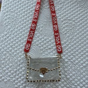 Gameday clear purse with beaded “go vols” strap.